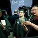 An Eastern Michigan University faculty member announce graduate names during the Commencement on Sunday, April 28. Daniel Brenner I AnnArbor.com